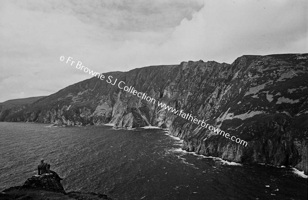 SLIEVE LEAGUE FROM BUNGLASS WITH MRS BYRNE IN FOREGROUND